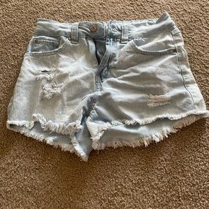 light wash ripped jean bootie shorts